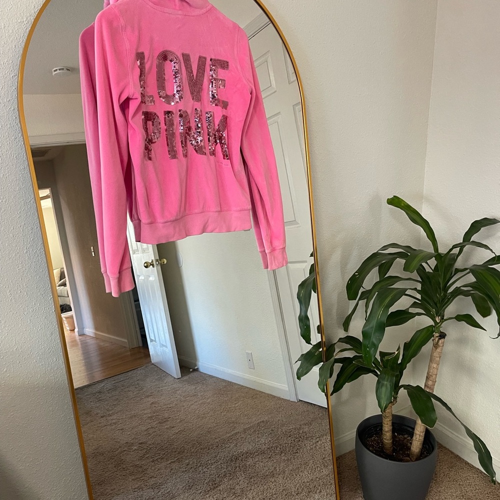 Pink track suit top by Victoria’s Secret.